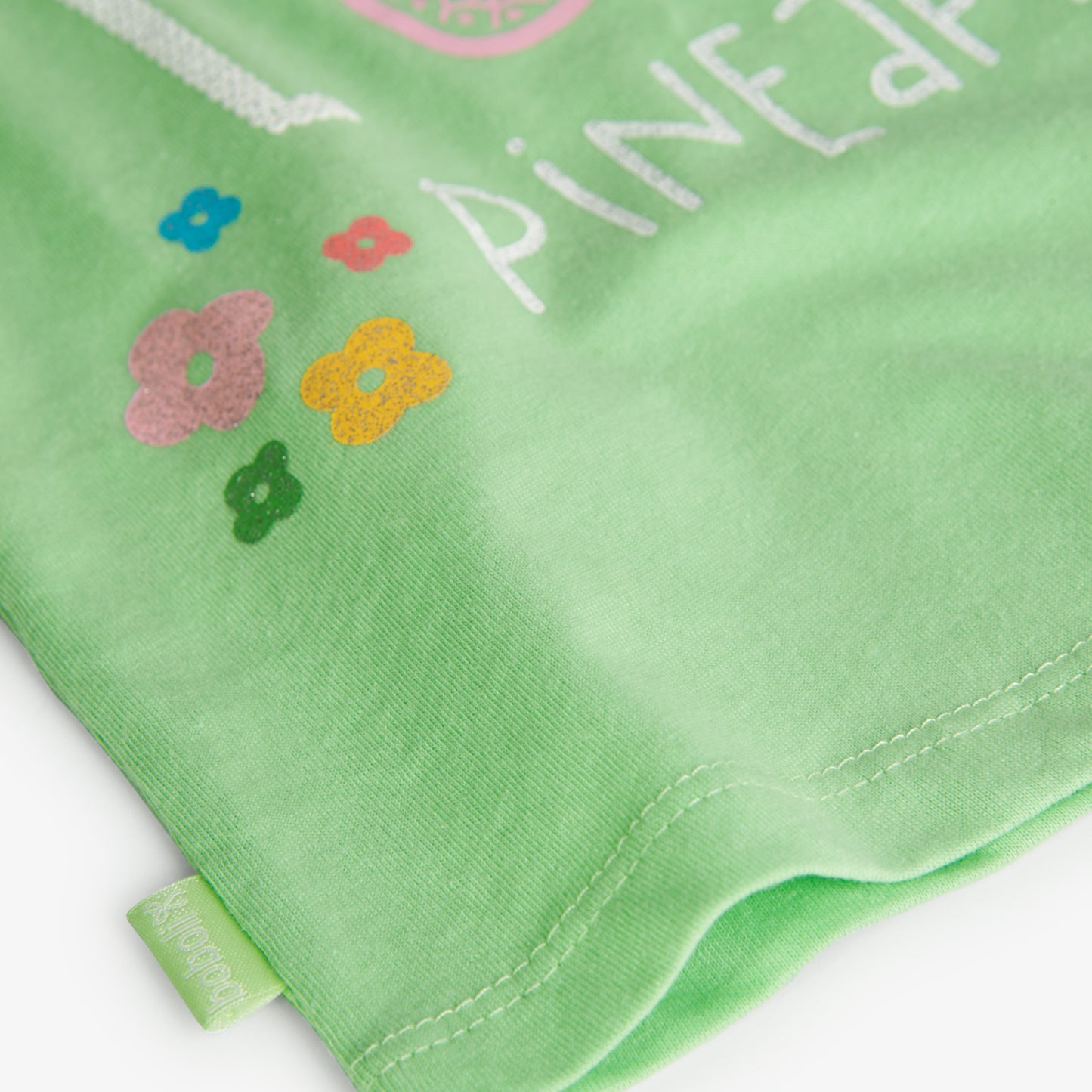 Camiseta verde limón estampada piña mini niña