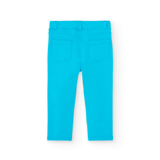 Pantalón felpa azul turquesa para mini niña