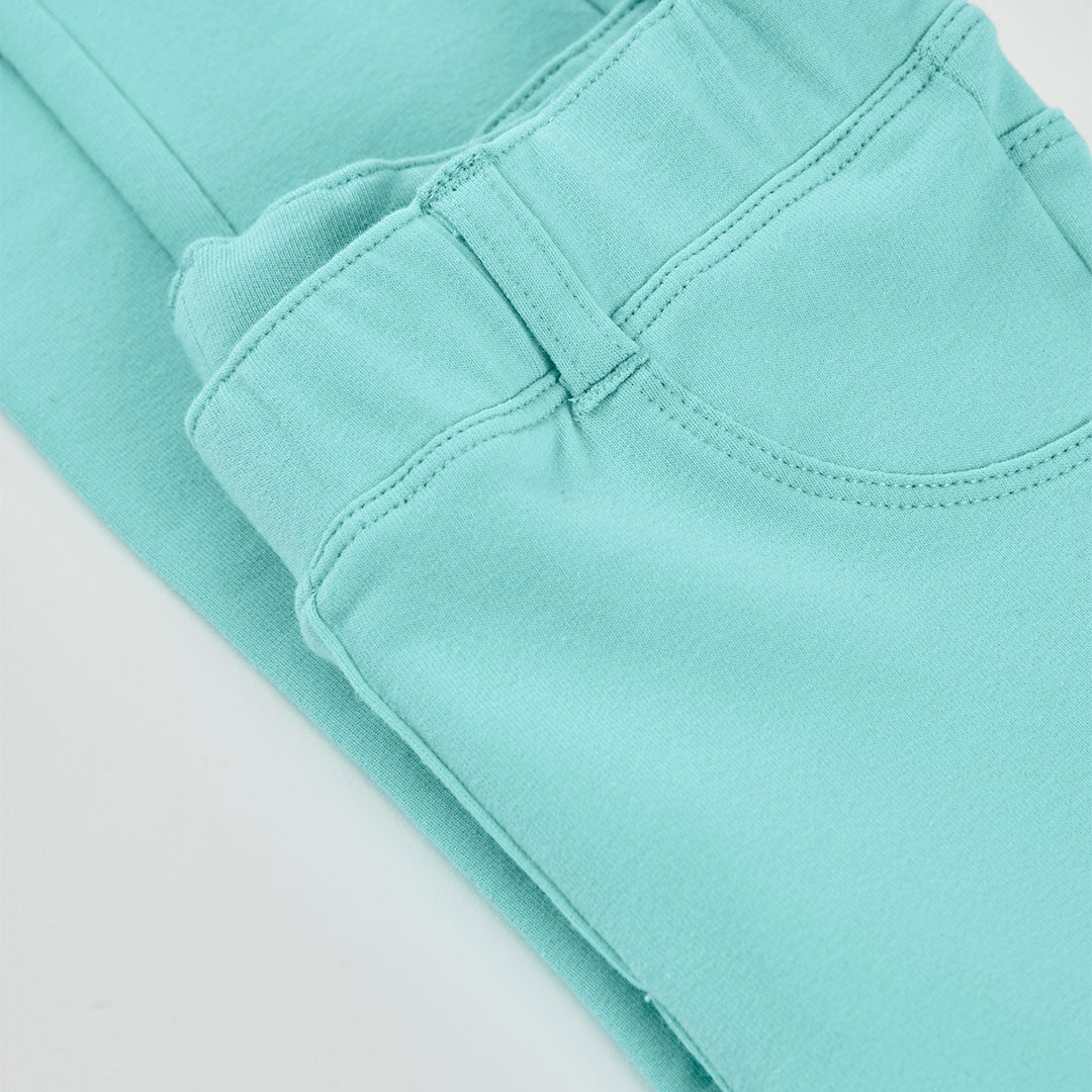 Conjunto blusa rosa con patalón felpa aqua mini niña
