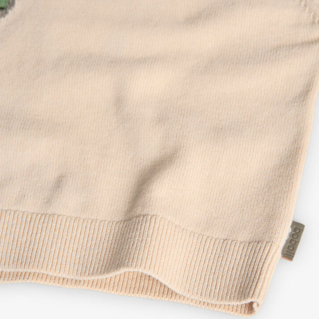 Suéter beige dino para mini niño
