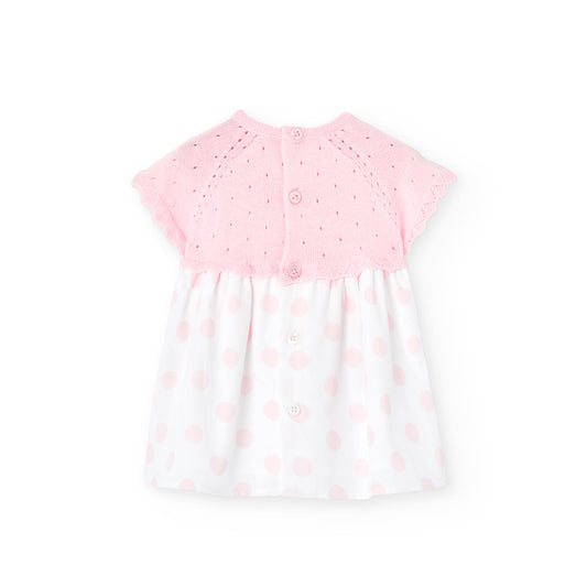 Vestido rosa para recién nacida