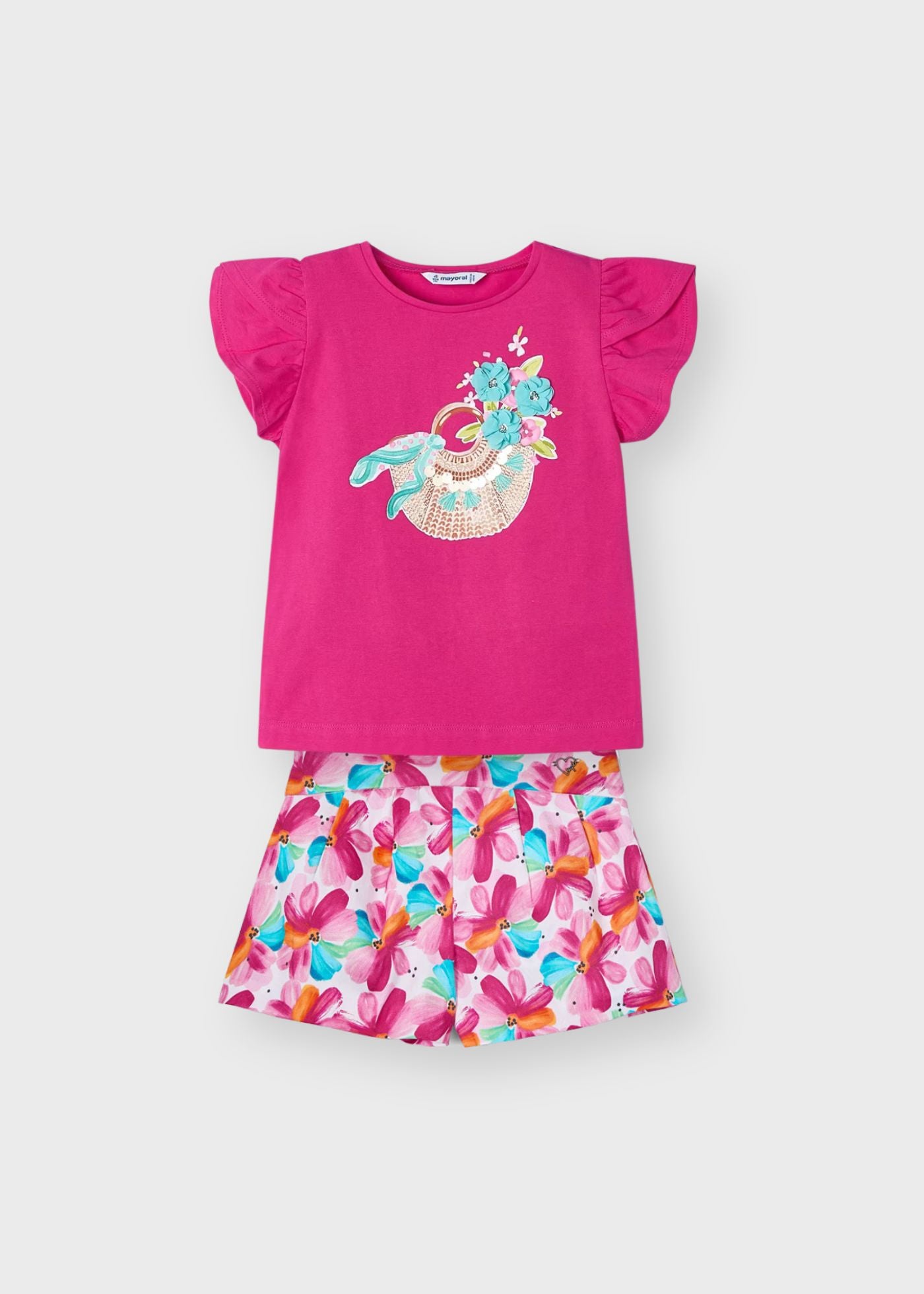 Conjunto blusa estampada con short mini niña