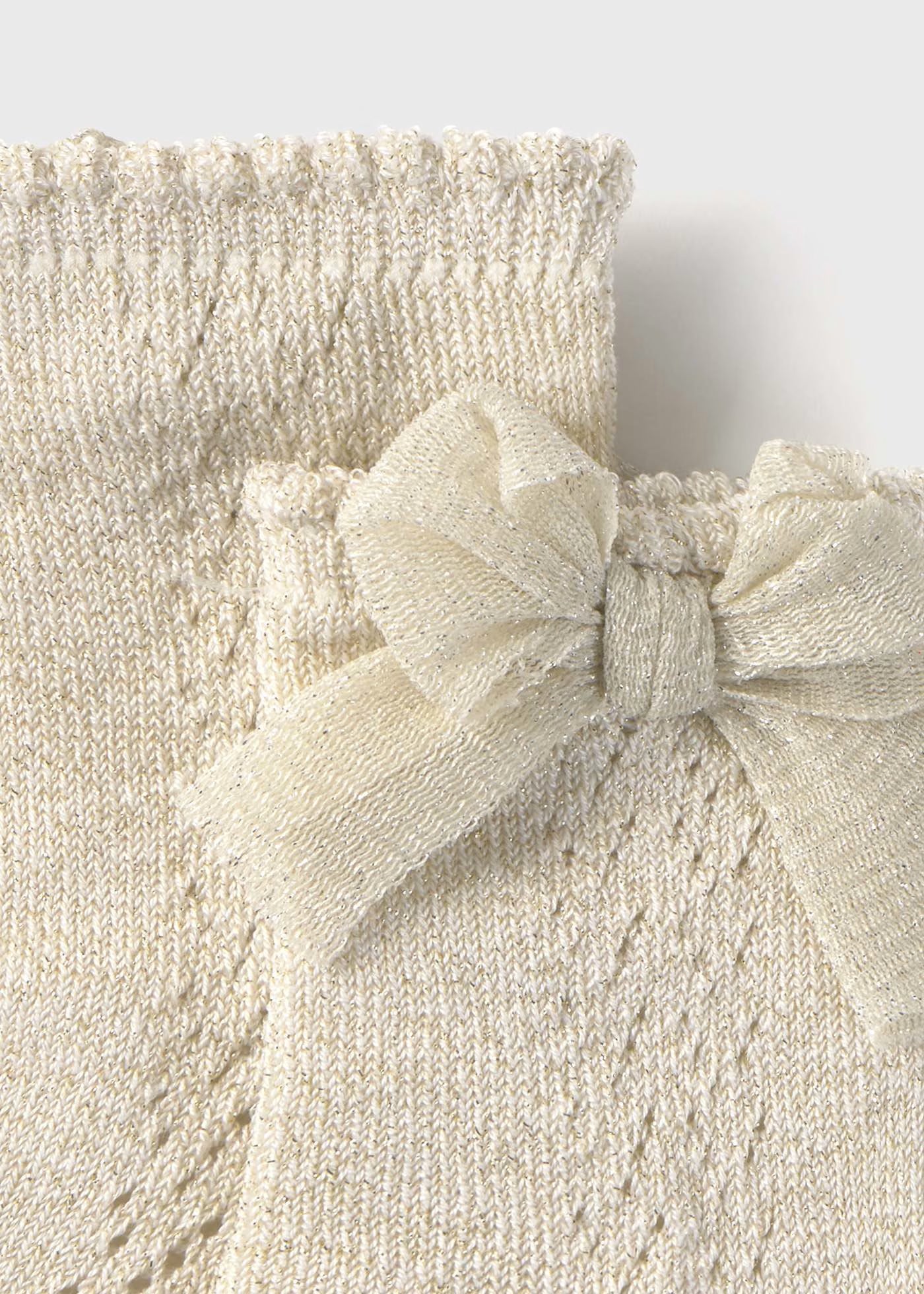 Calcetín alto champagne para bebé niña