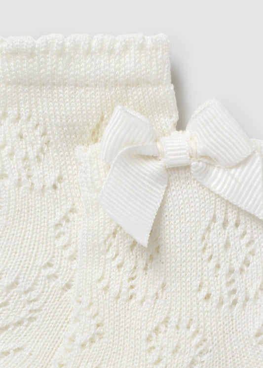 Calcetin calado hueso recién nacida