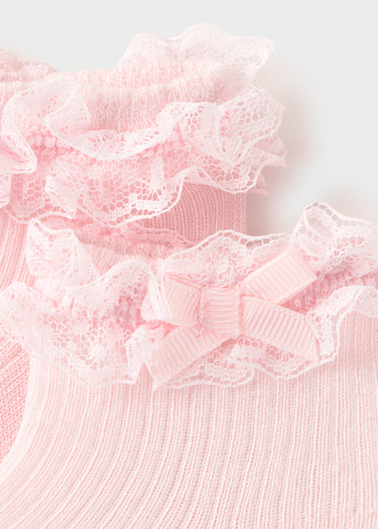 Calcetín holán rosa recién nacida