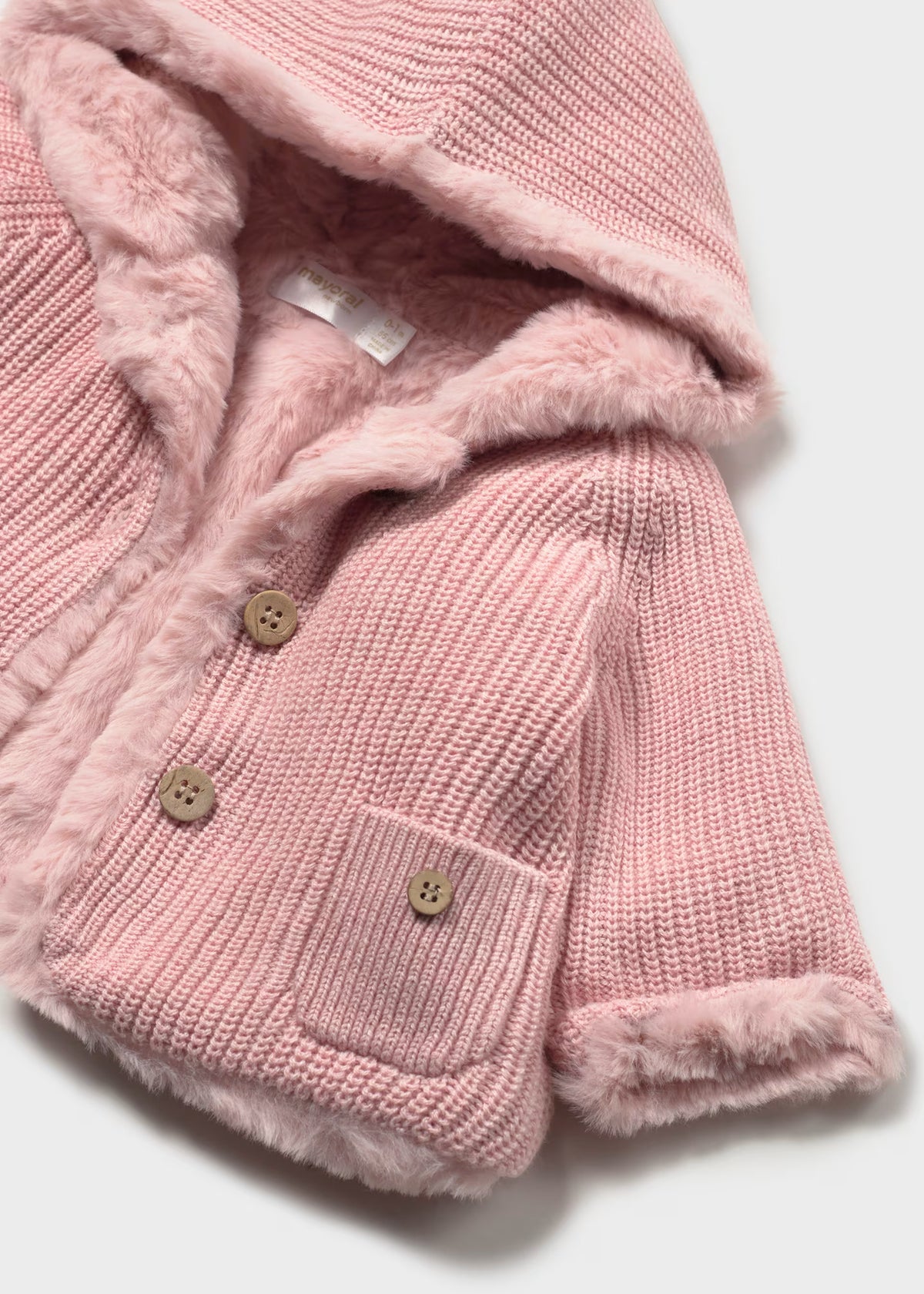 Chamarra pompón rosa recién nacida