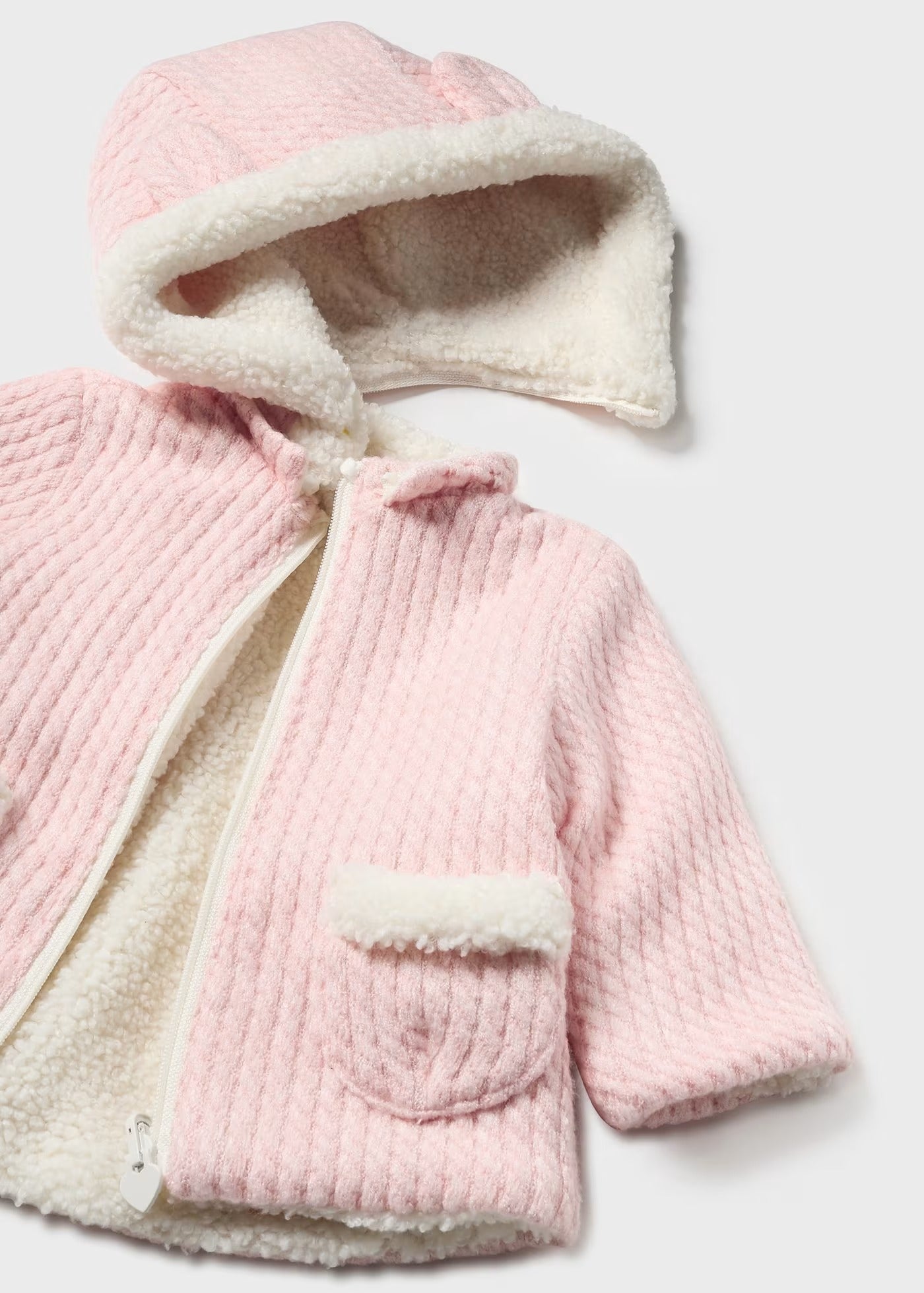Chamarra reversible rosa recién nacida