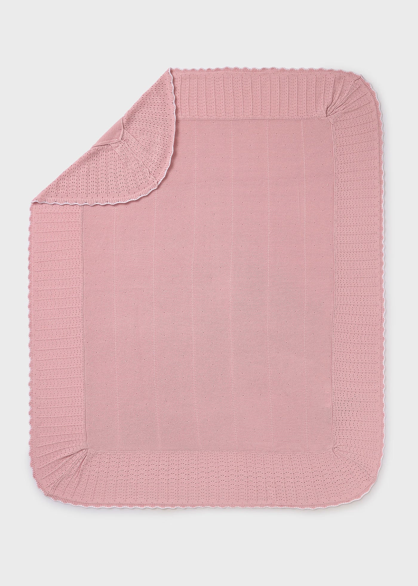 Frazada tricot rosa recién nacida