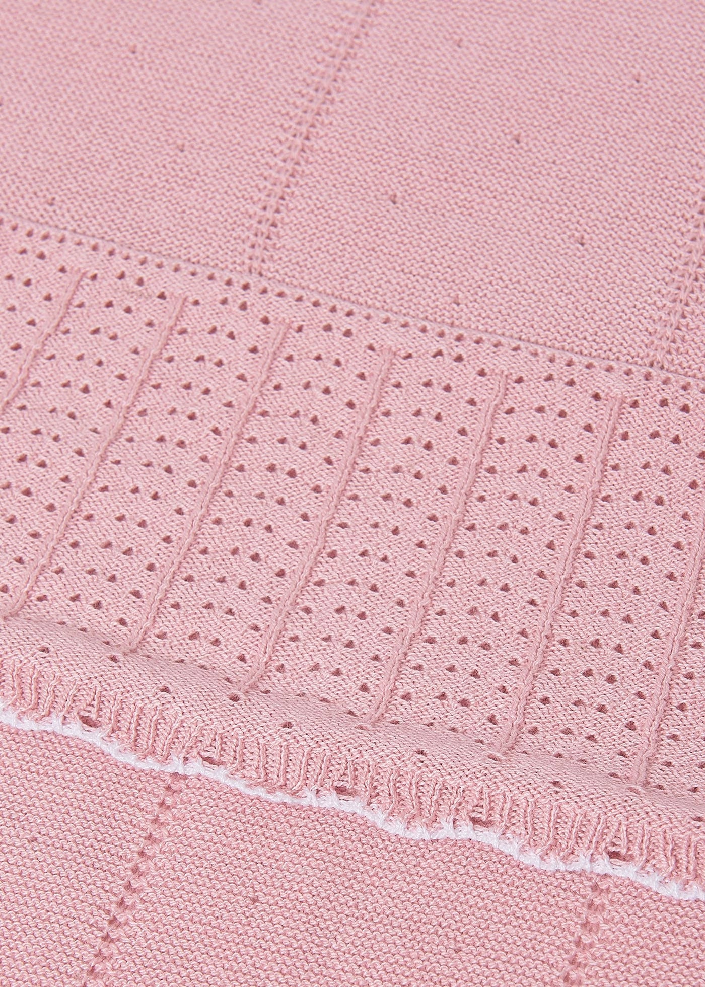 Frazada tricot rosa recién nacida