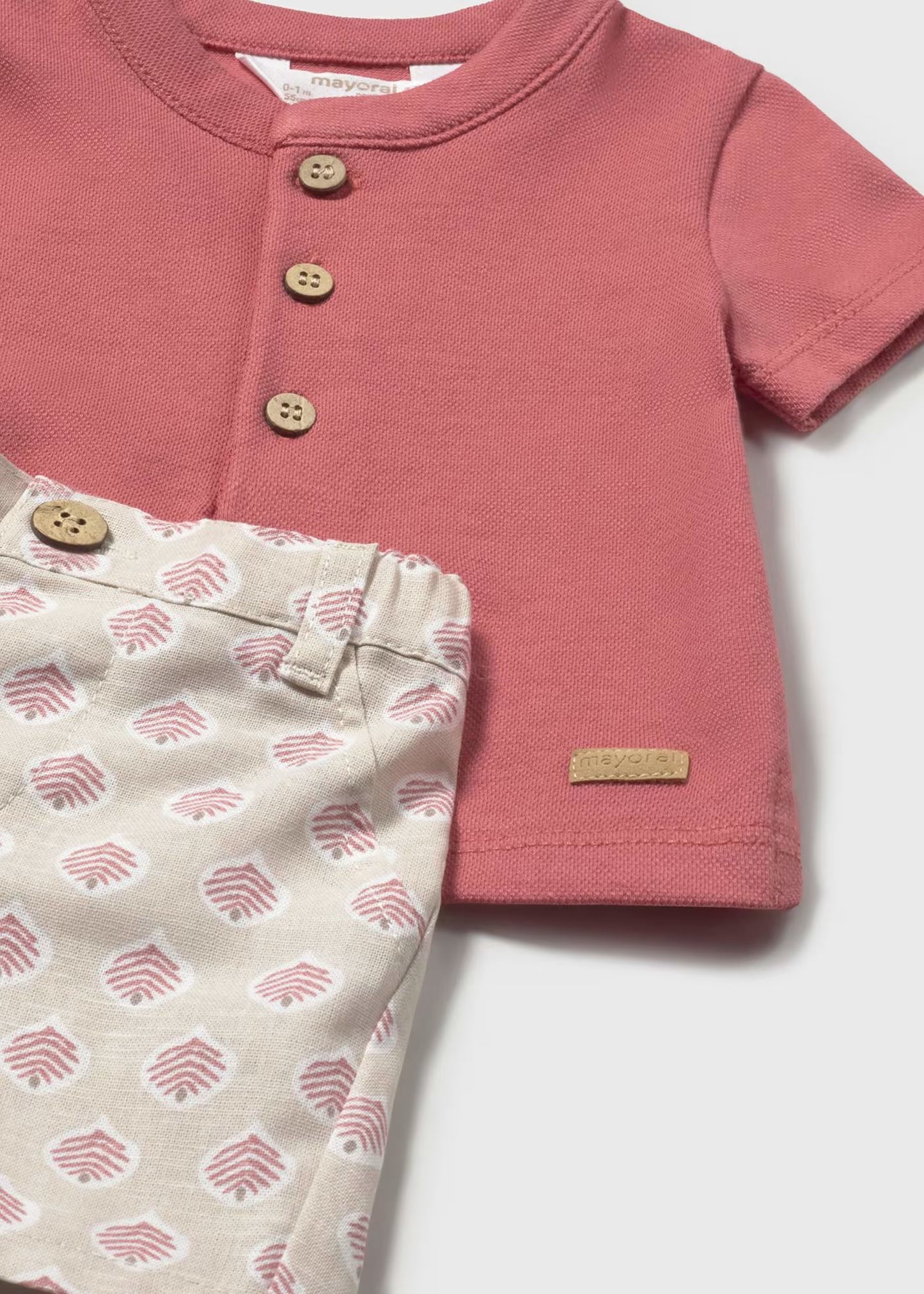 Conjunto short estampado y polo terracota recién nacido
