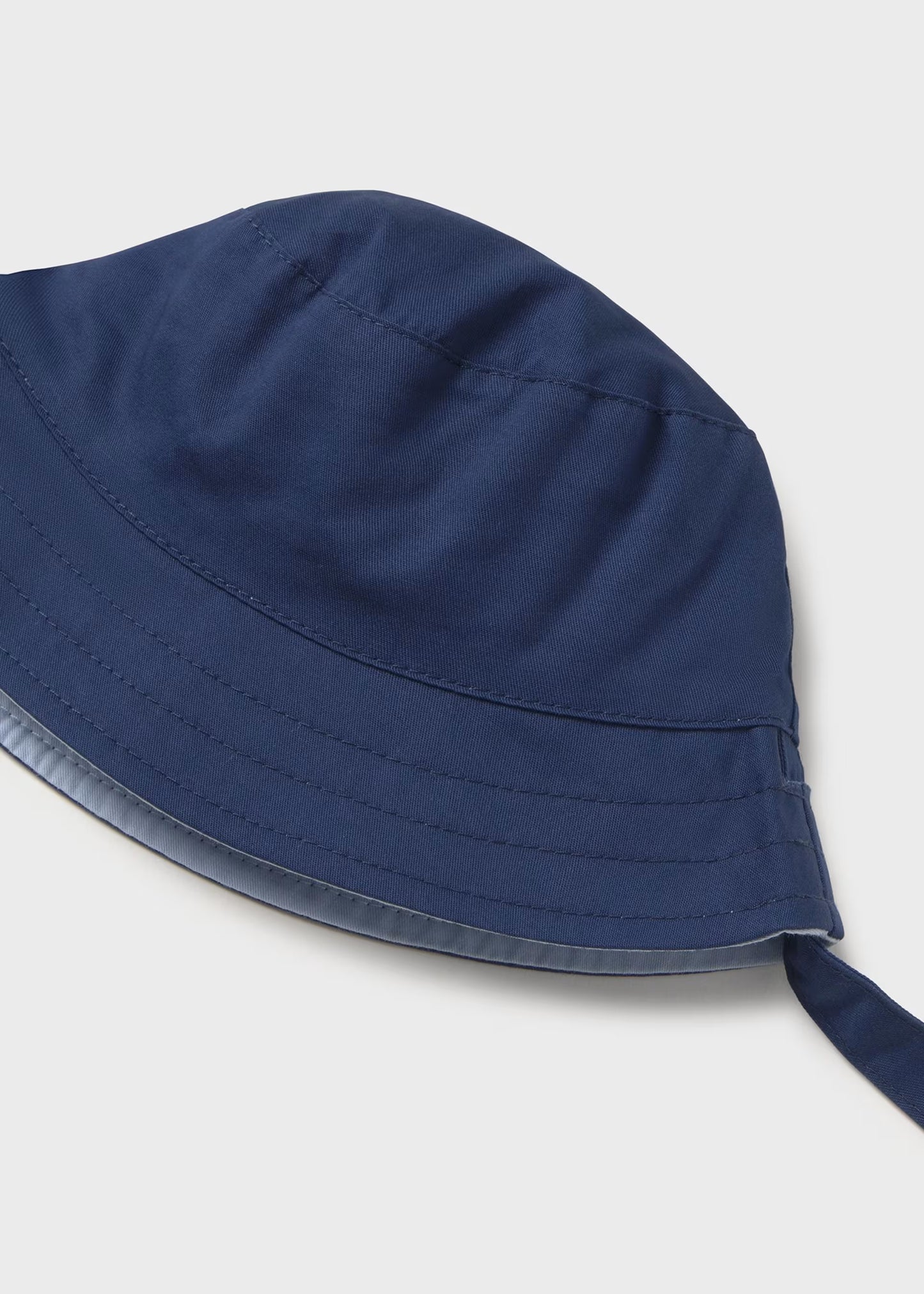 Gorro reversible azul recién nacido y bebé niño