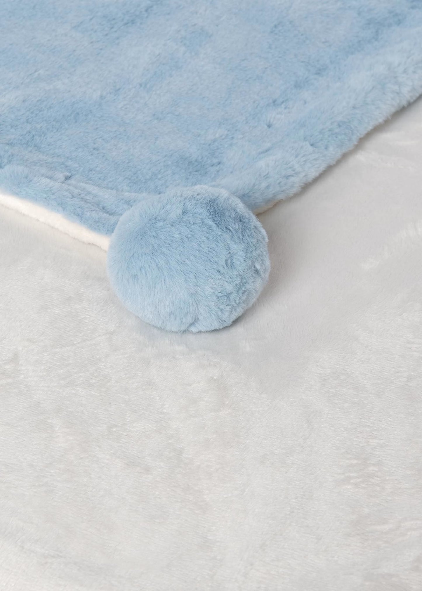 Manta con pompón azul recién nacido