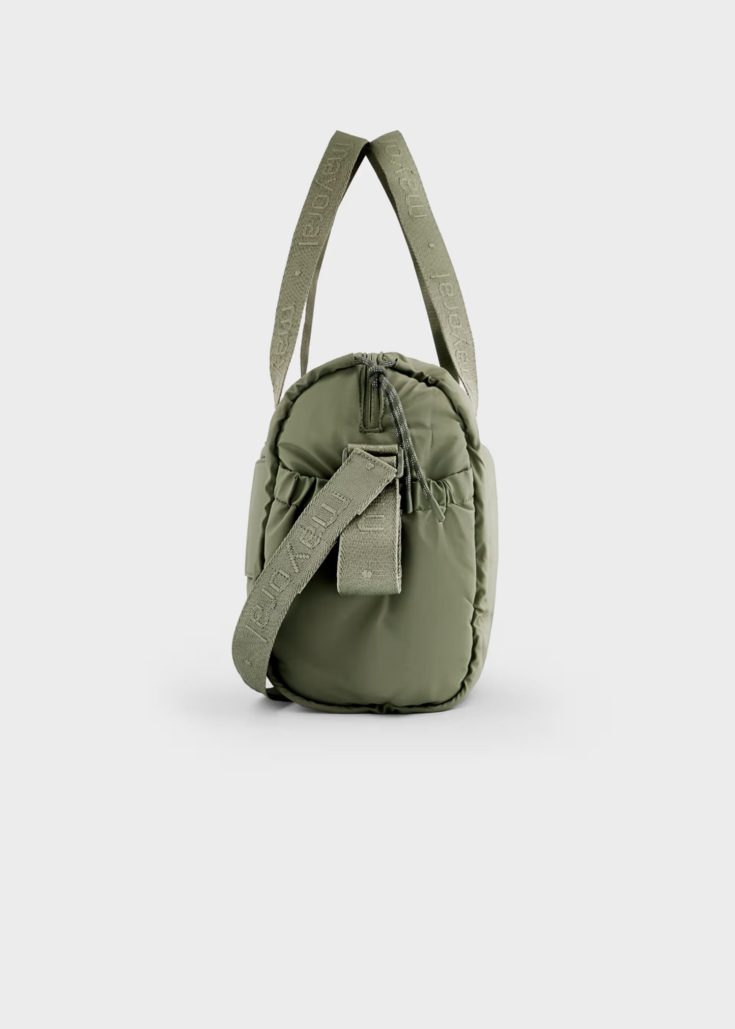 Bolso pañalera impermeable verde recién nacido