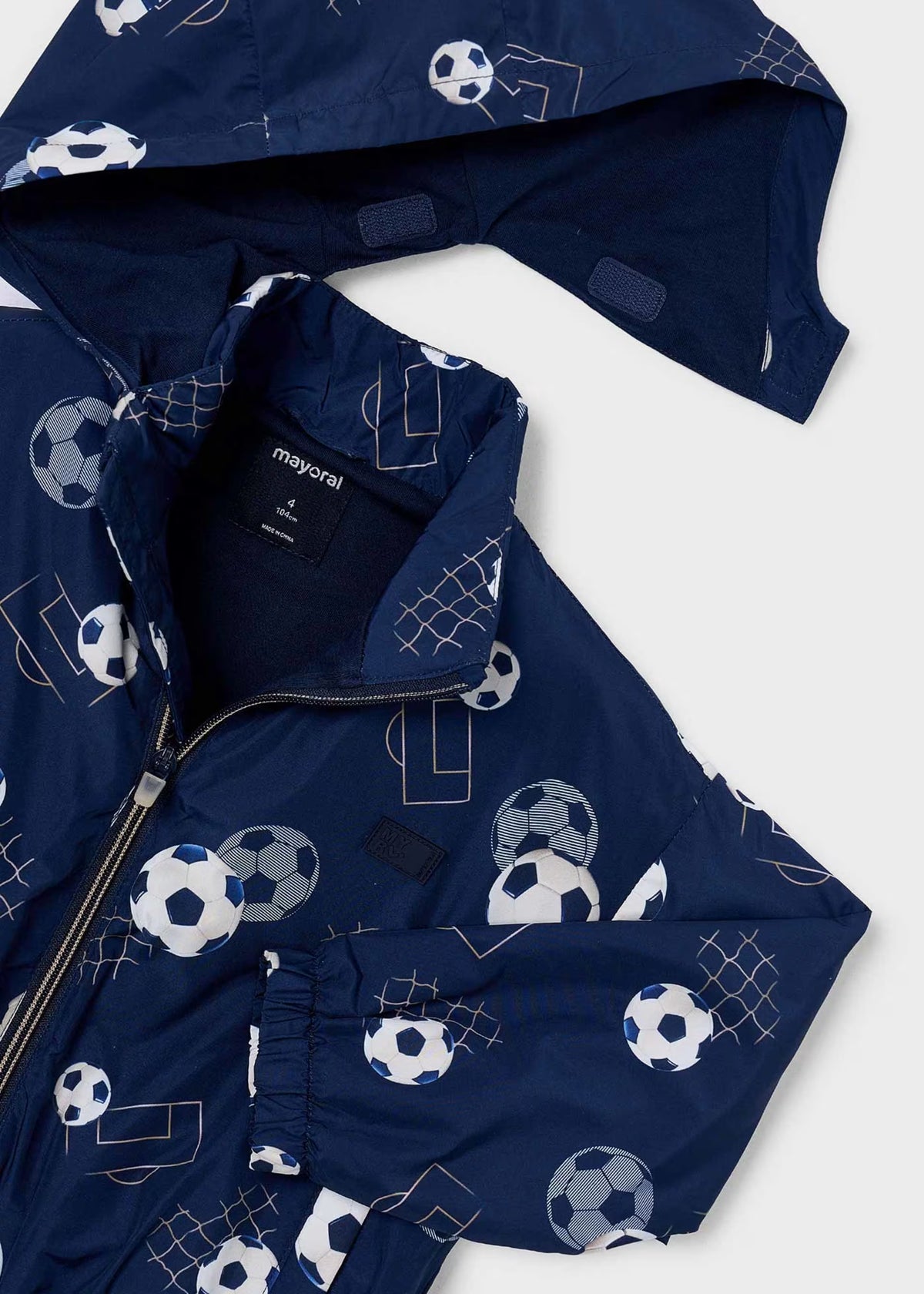 Impermeable fútbol azul marino mini niño