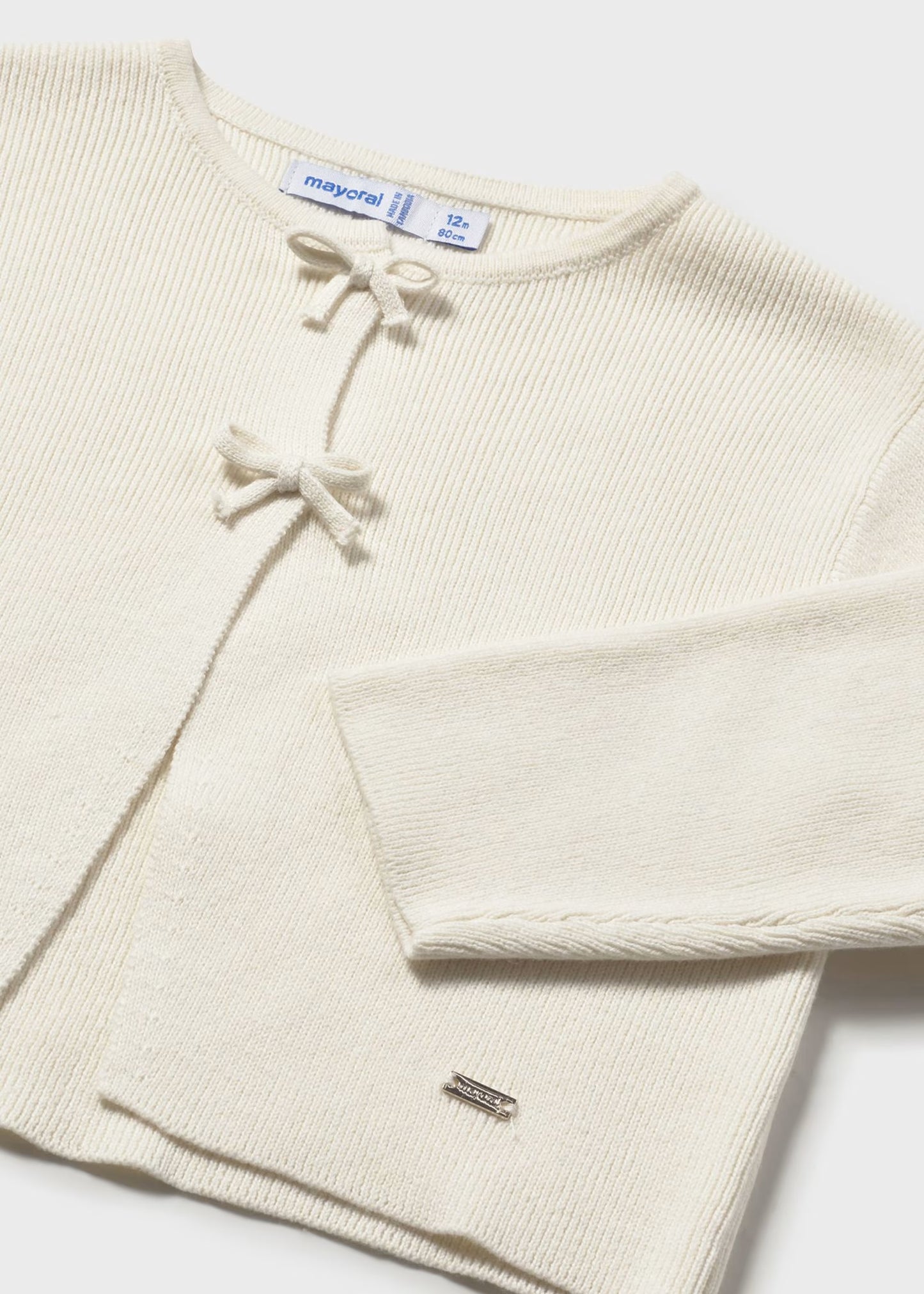 Suéter torera tricot moños bebé niña