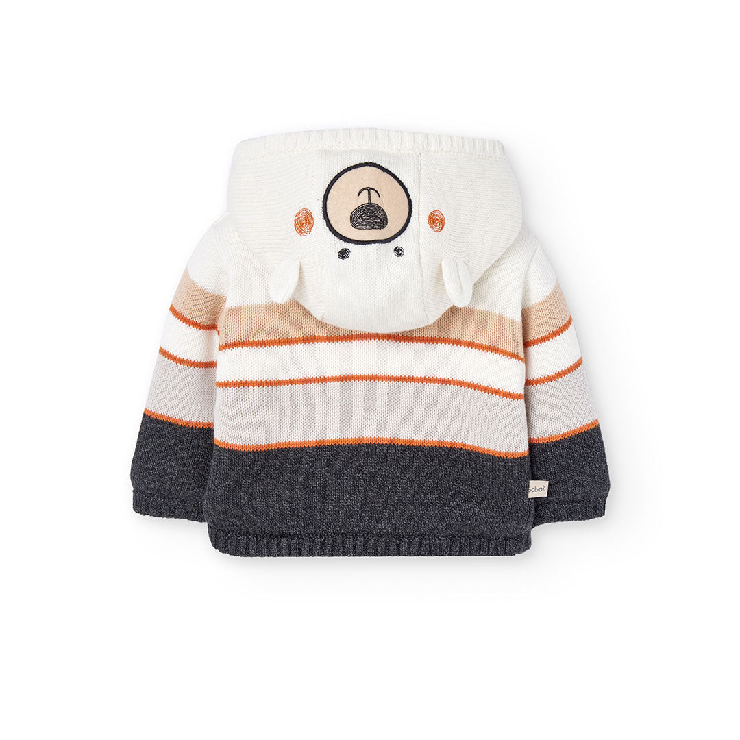 Chamarra tejida blanco y negro con borrega bebé niño