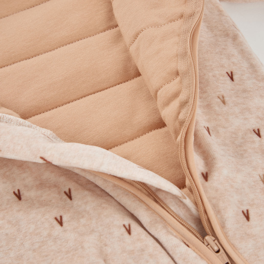 Buzo terciopelo estampado beige recién nacido