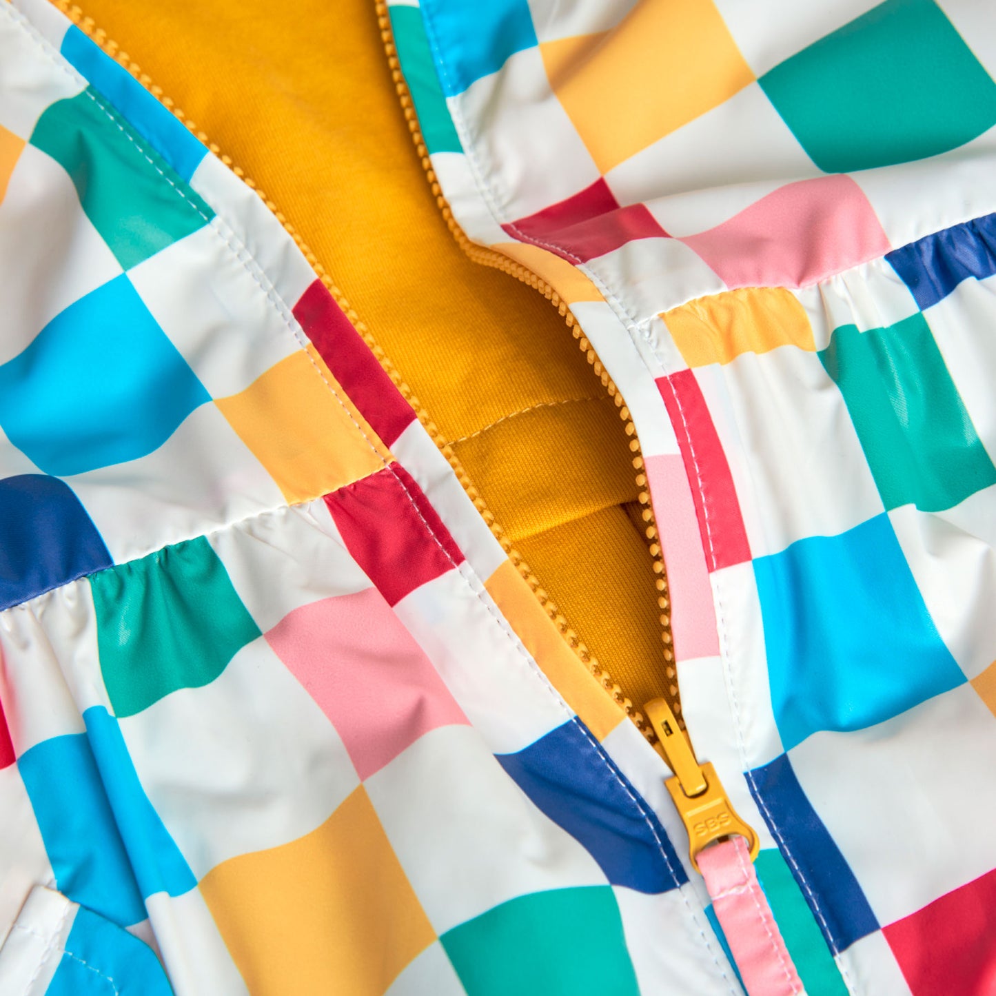 Impermeable reversible cuadros para mini niña
