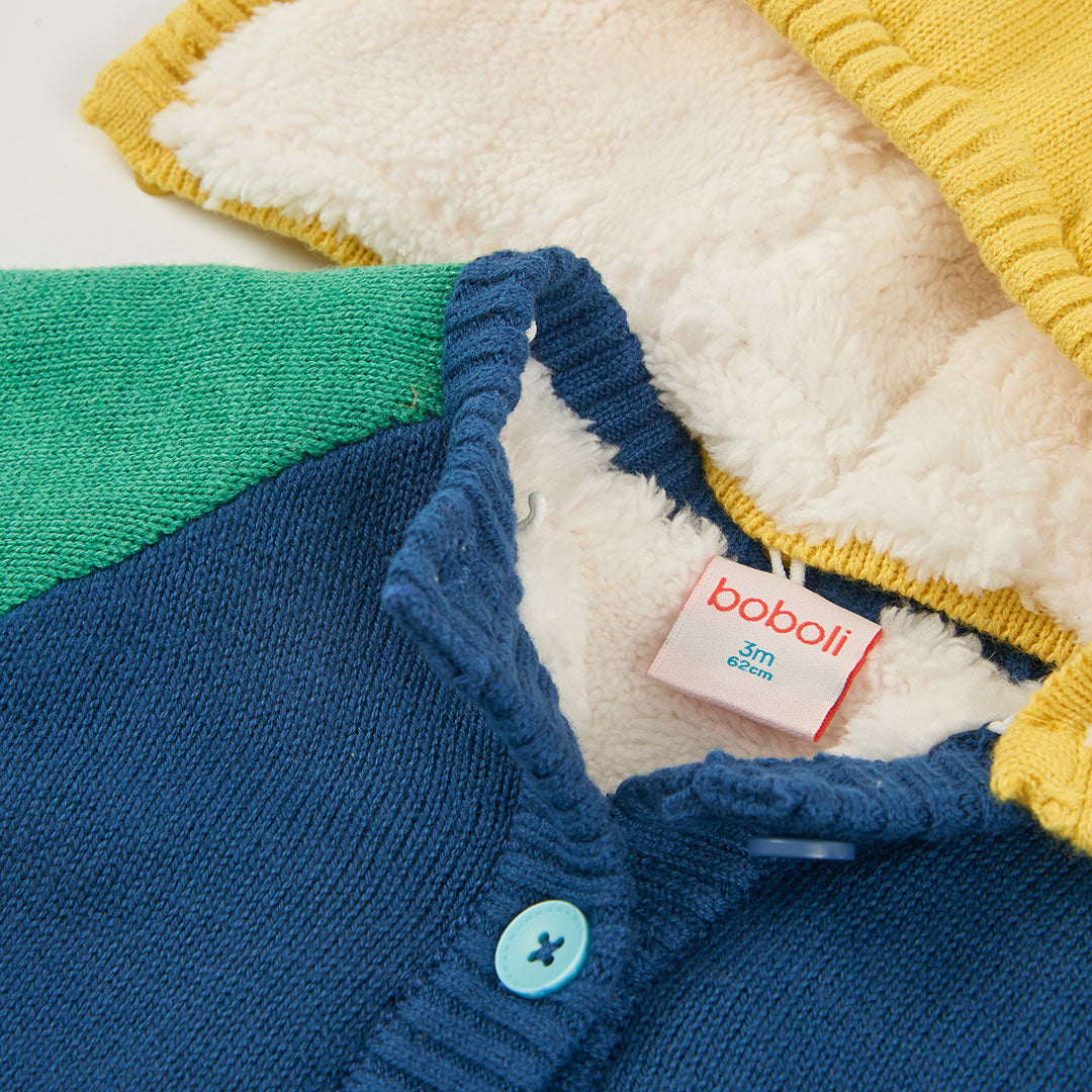 Chamarra tricot azul con capucha bebé niño