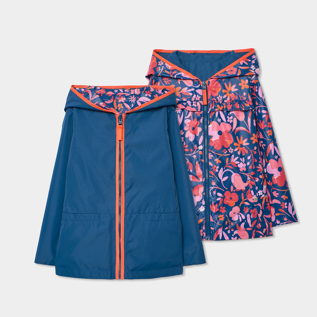 Impermeable reversible azul marino flores mini niña