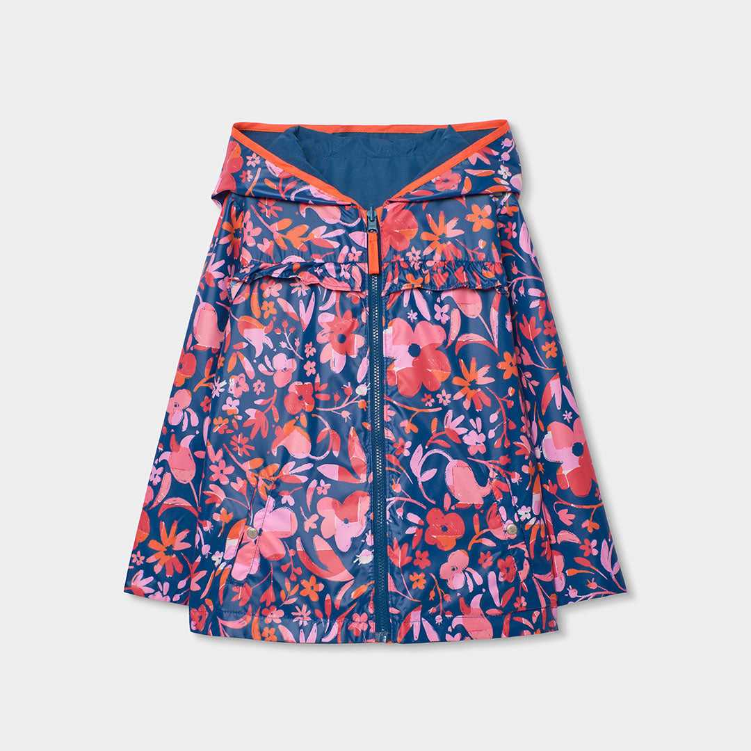 Impermeable reversible azul marino flores mini niña