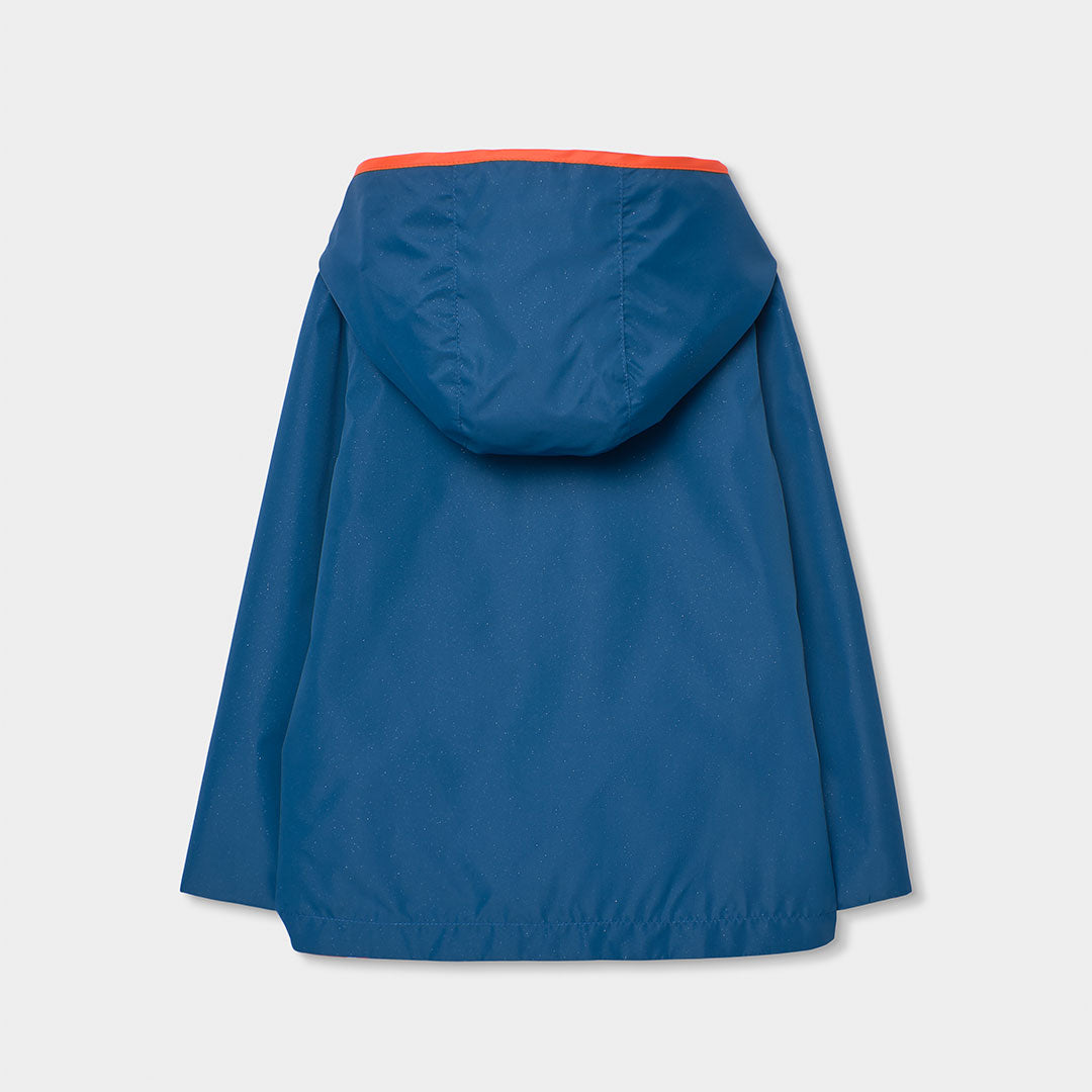 Impermeable reversible azul marino flores mini niña