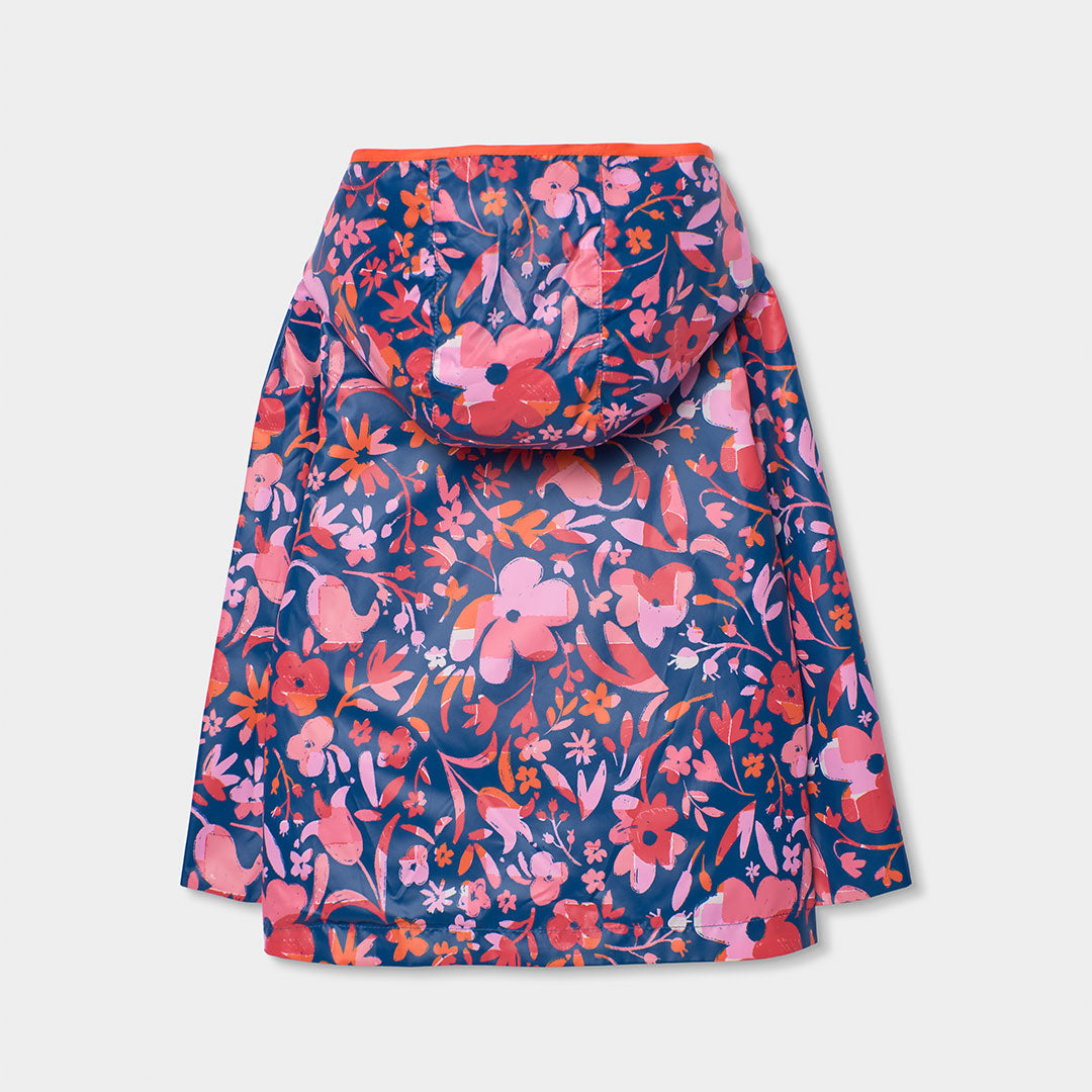 Impermeable reversible azul marino flores mini niña