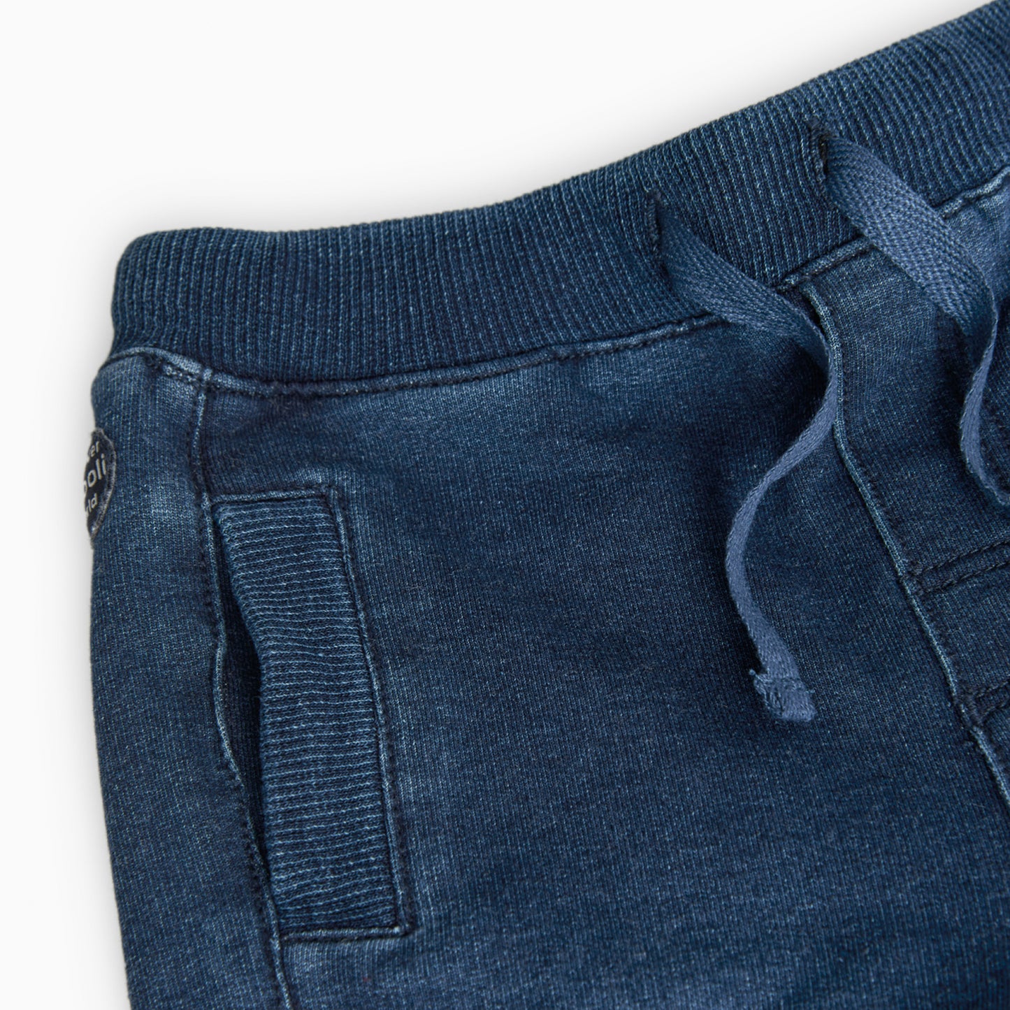 Pantalón felpa azul tipo jogger para mini niño