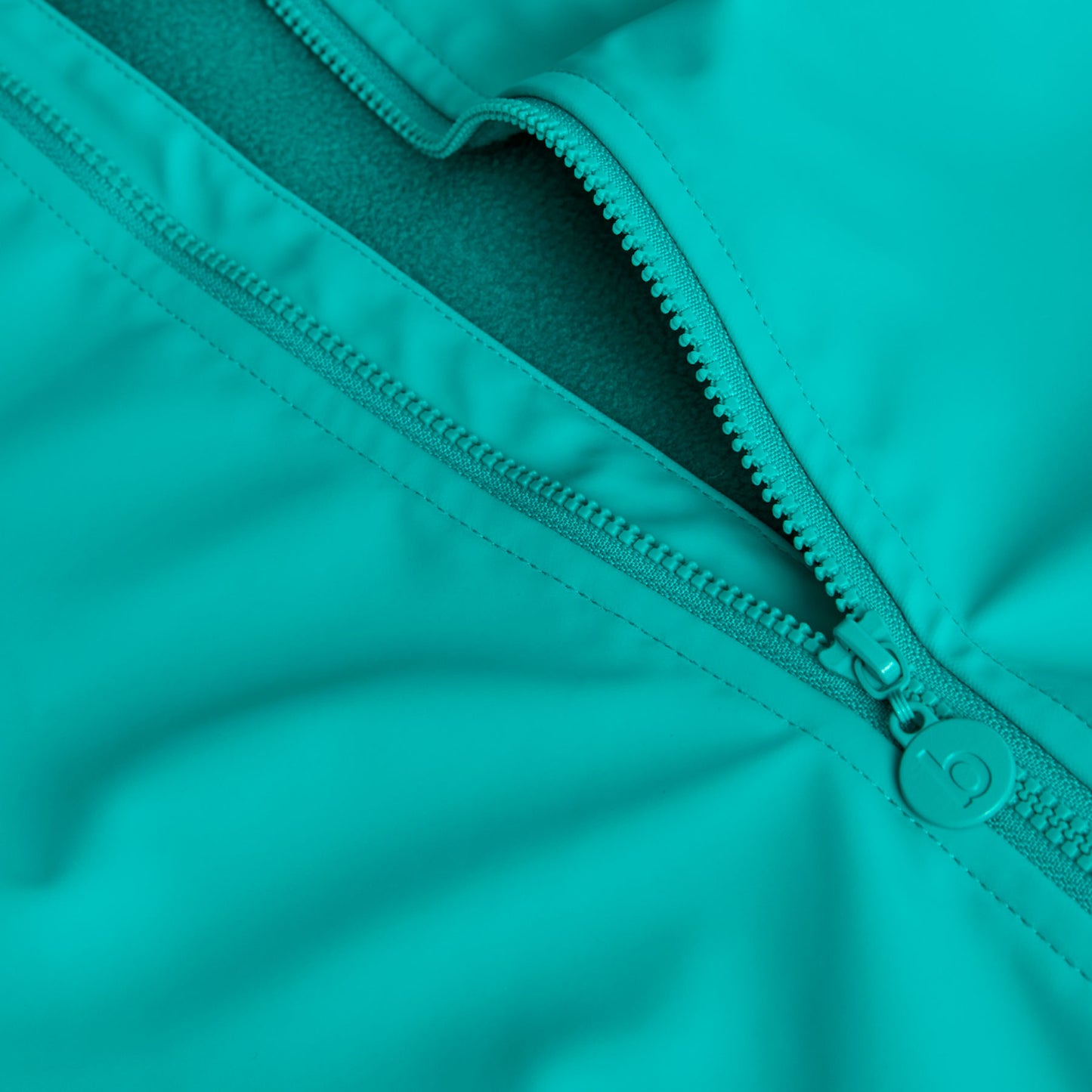 Impermeable con capucha dino mini niño