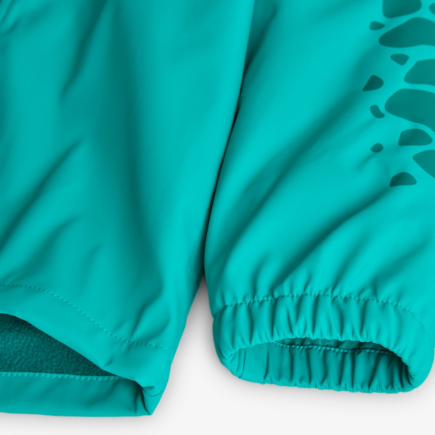 Impermeable con capucha dino mini niño