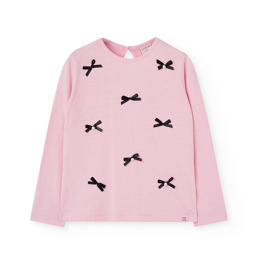 Blusa rosa con moñitos niña jr