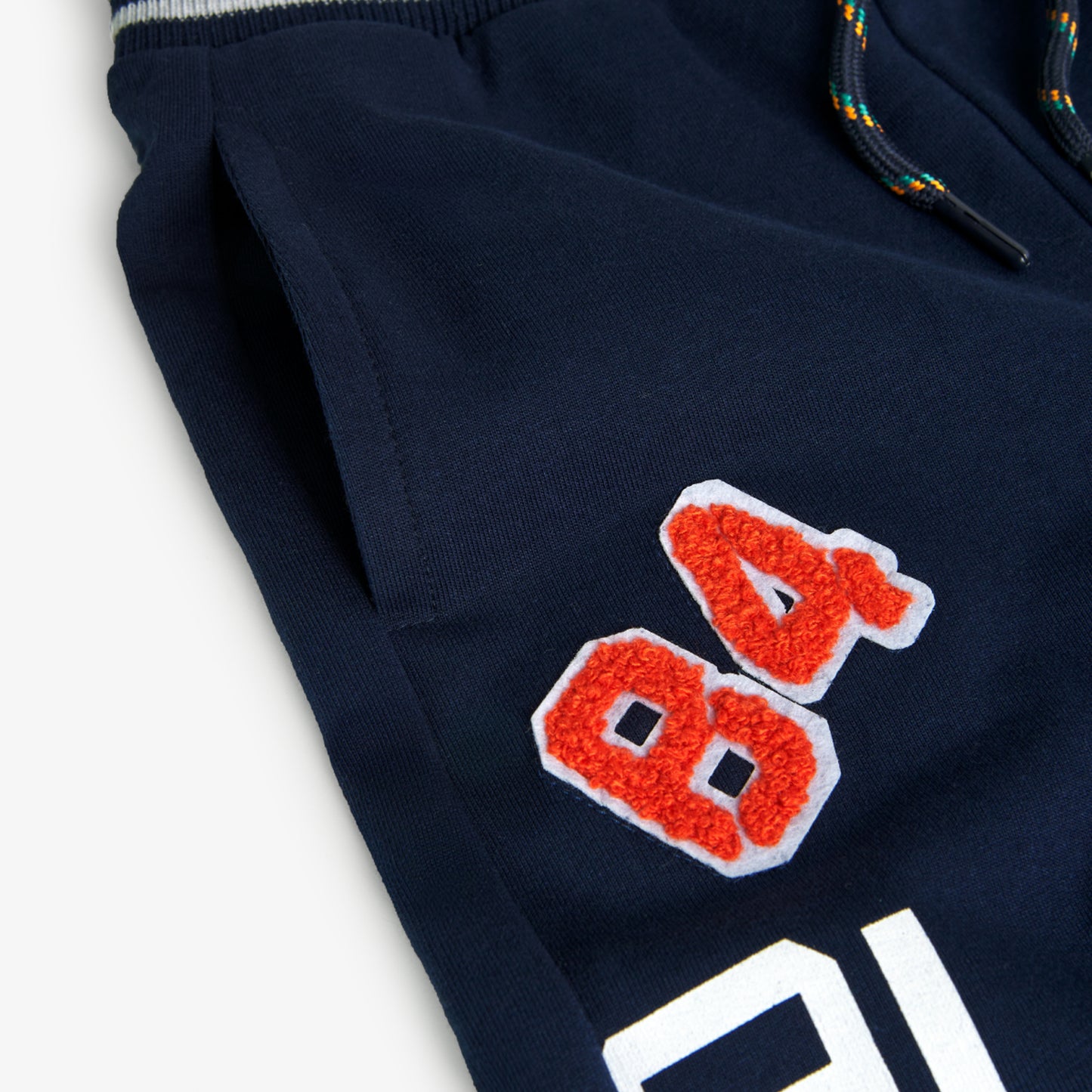 Conjunto de pants felpa naranja Legend mini niño