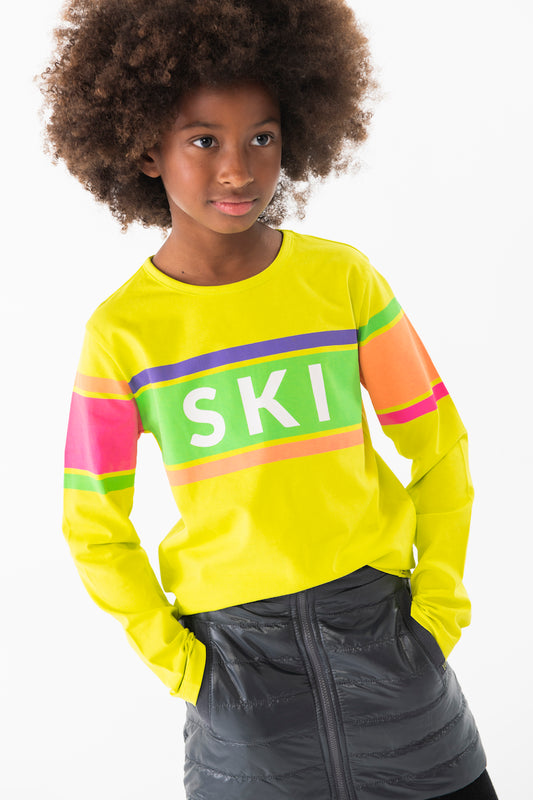 Conjunto blusa neon con falda y mallas para niña jr