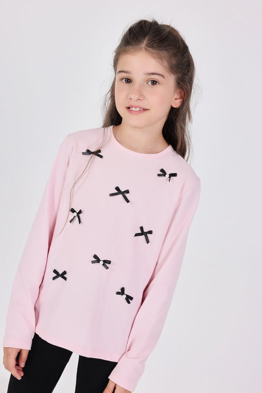 Blusa rosa con moñitos niña jr