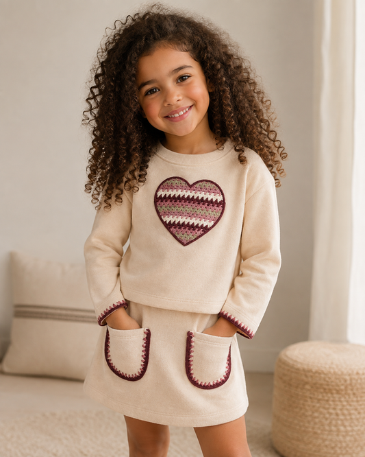 Conjunto falda felpa hueso mini niña