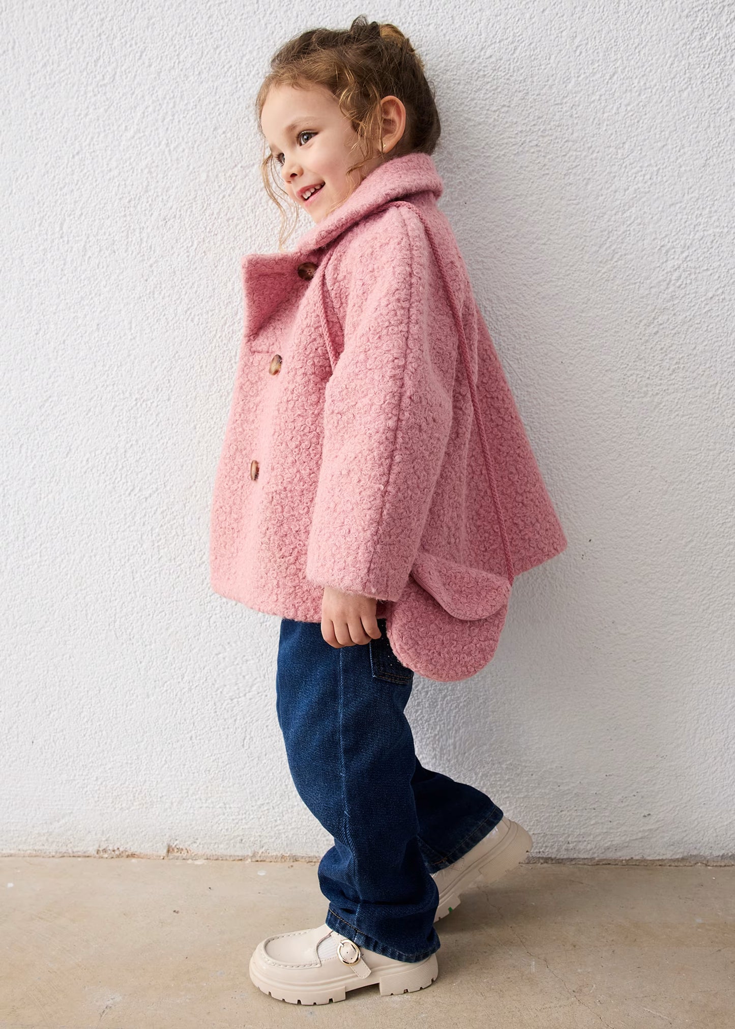Abrigo rizo rosa con bolsa mini niña