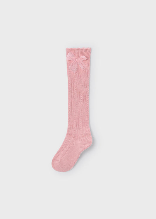 Calceta alta rosa con moño mini niña