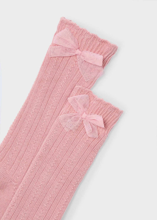 Calceta alta rosa con moño mini niña