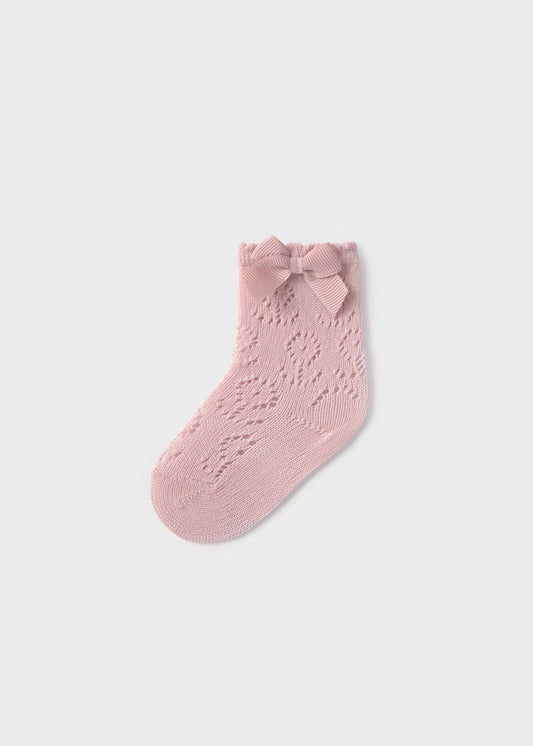 Calcetin calado rosa recién nacida
