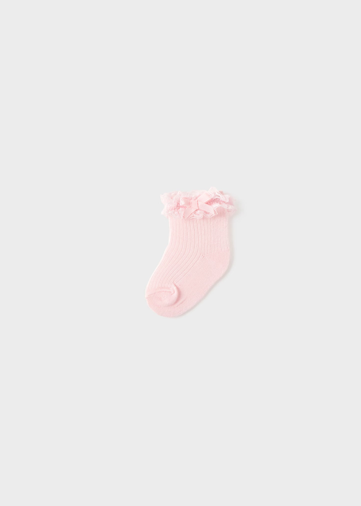 Calcetín holán rosa recién nacida