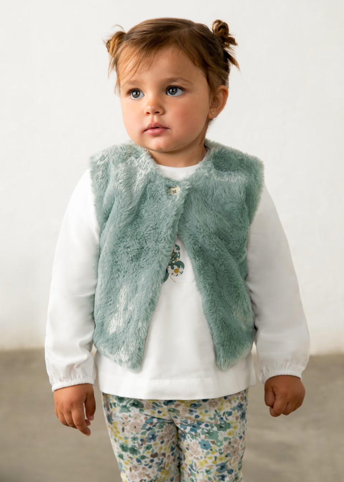 Conjunto de leggings con chaleco pelo bebé niña