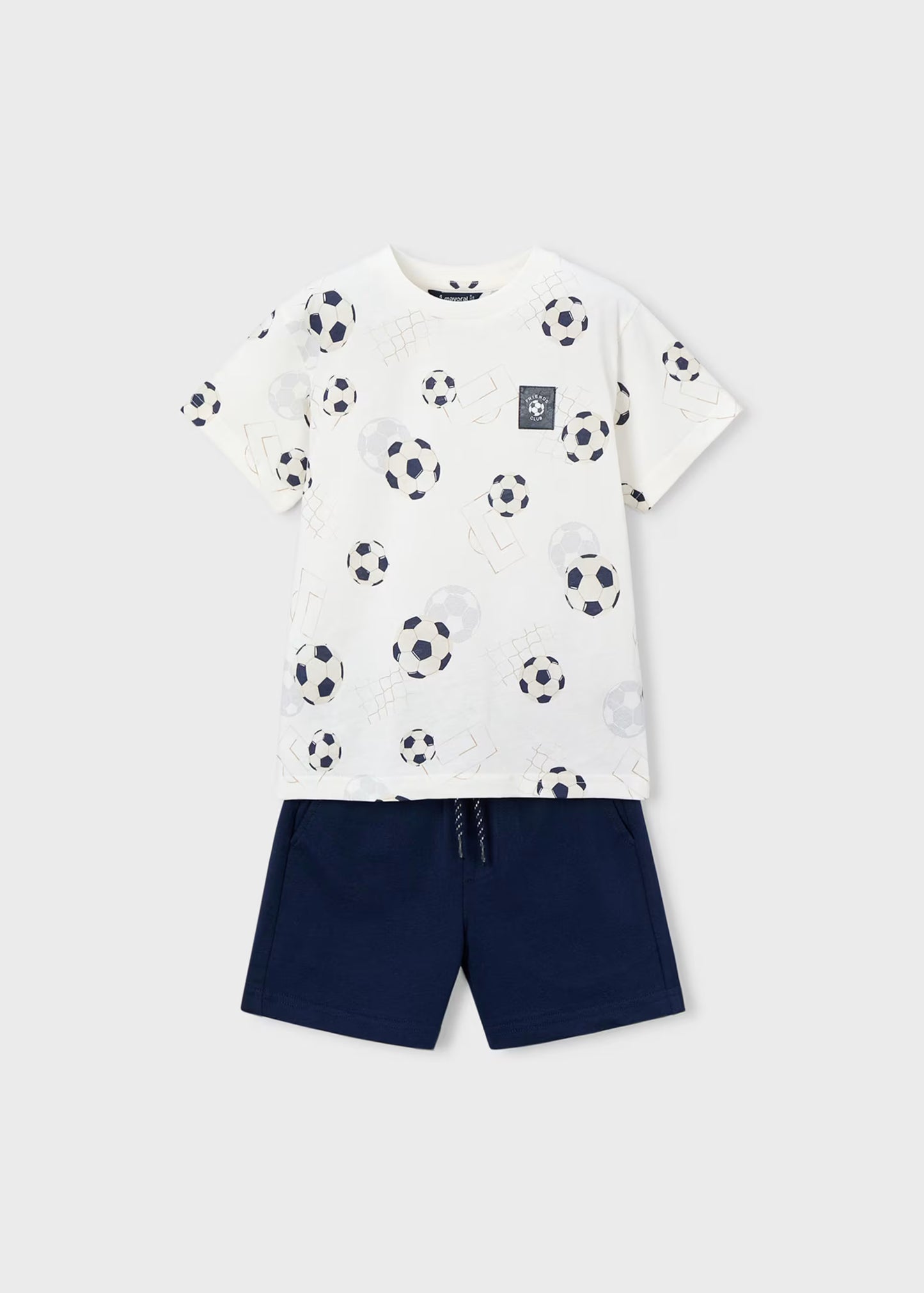Conjunto short y playera estampada fútbol mini niño