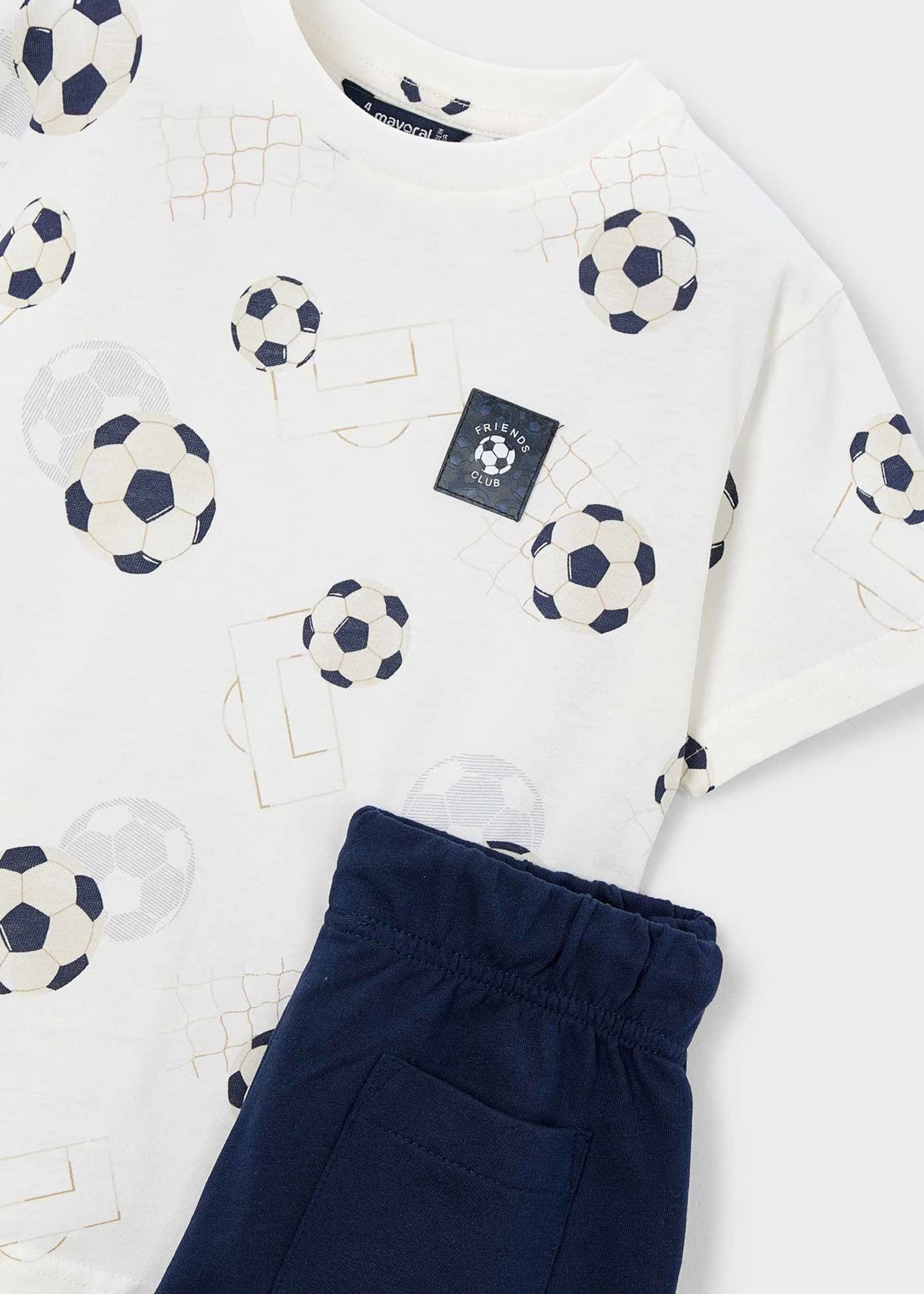 Conjunto short y playera estampada fútbol mini niño