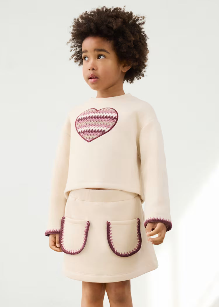 Conjunto falda felpa hueso mini niña