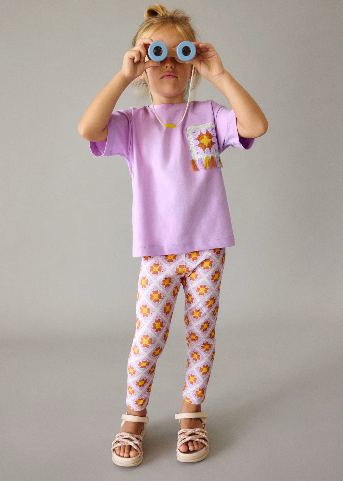 Conjunto legging estampado y blusa lila mini niña