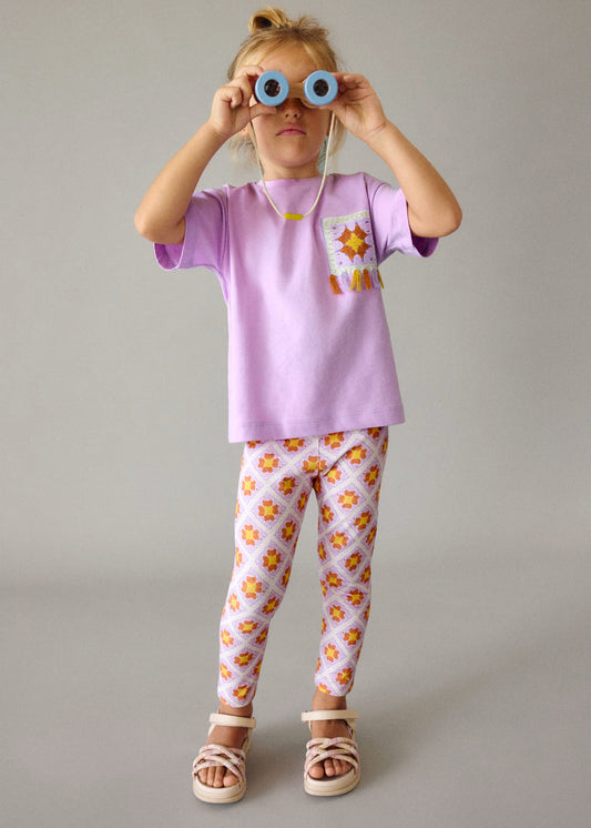 Conjunto legging estampado y blusa lila mini niña