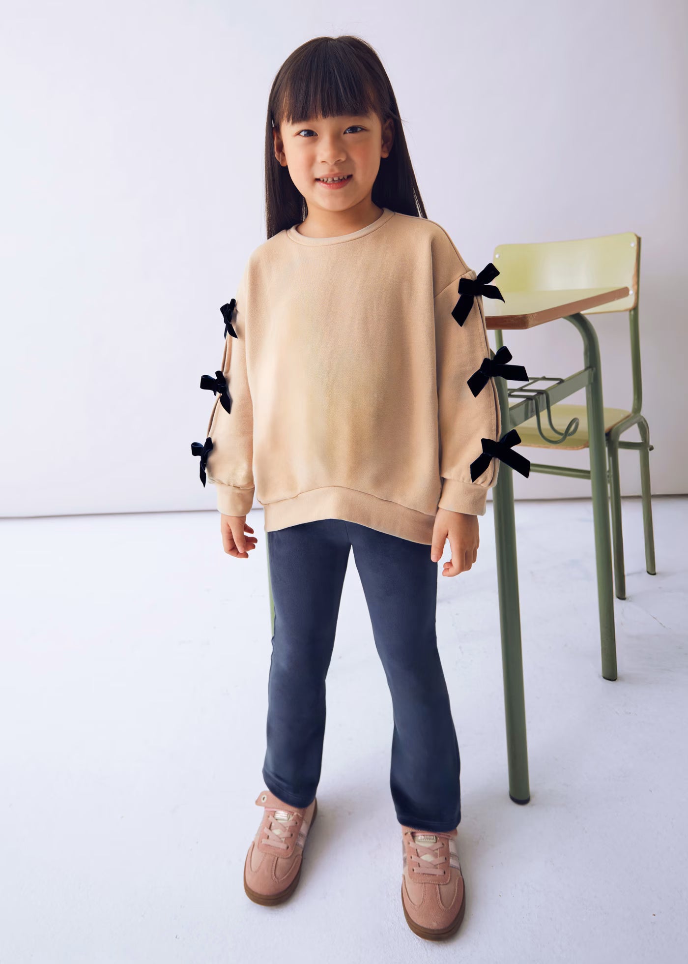 Conjunto legging y sudadera moños mini niña