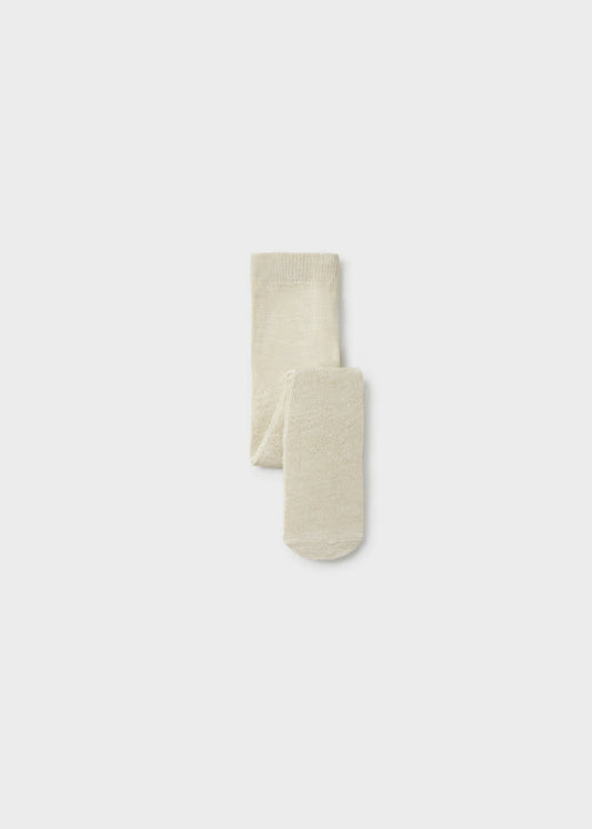 Mallas beige hojaldre bebé niña