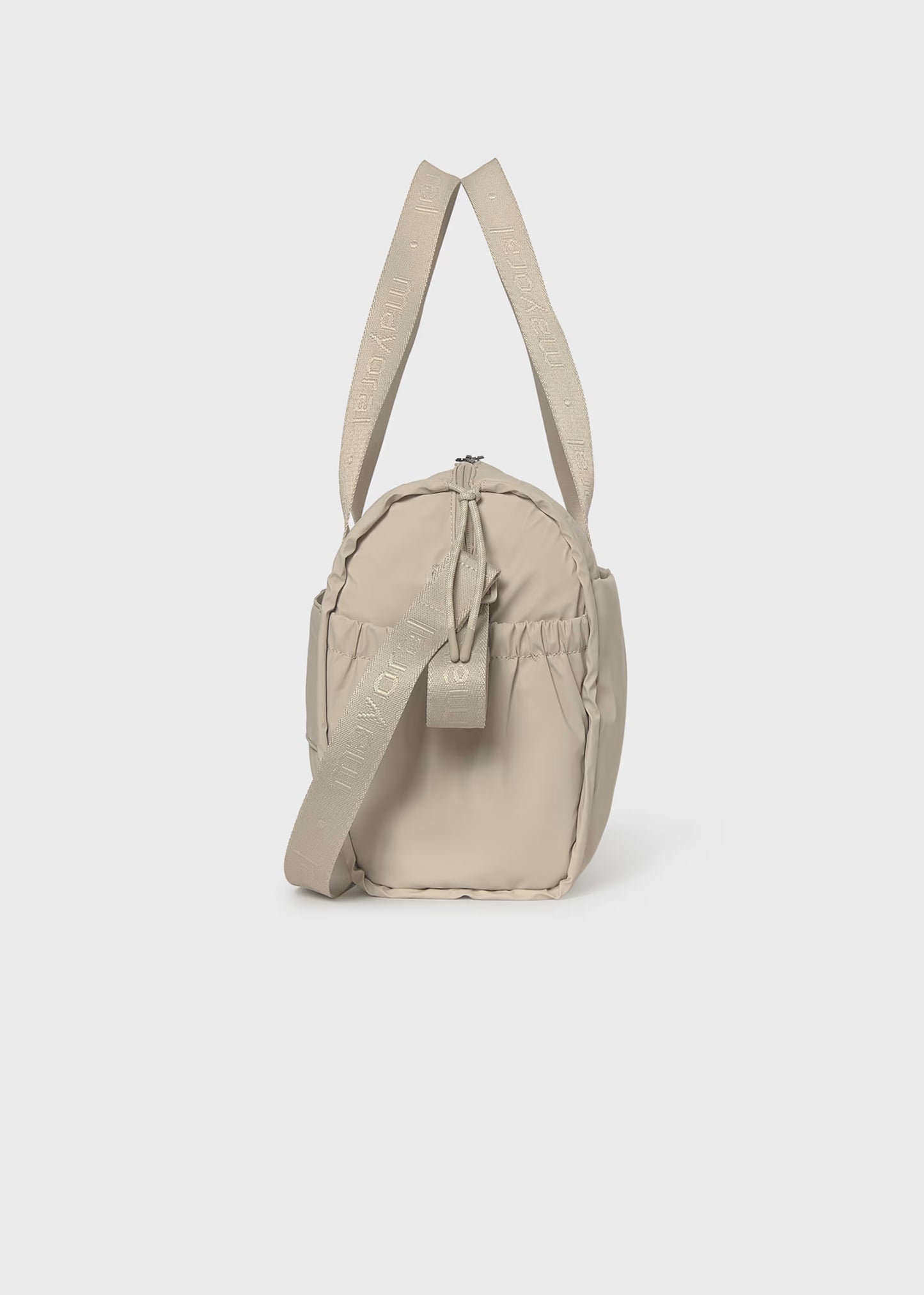 Bolso pañalera impermeable beige recién nacido