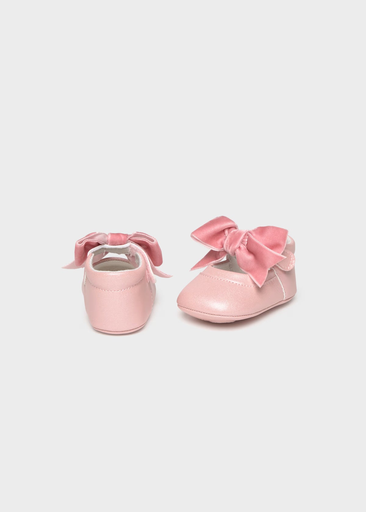 Zapatitos moño rosa recién nacida